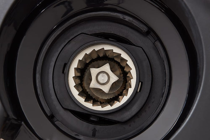 Close-up of a Wilfa Svart Aroma Precision Coffee Grinder burrs with a central shaft.