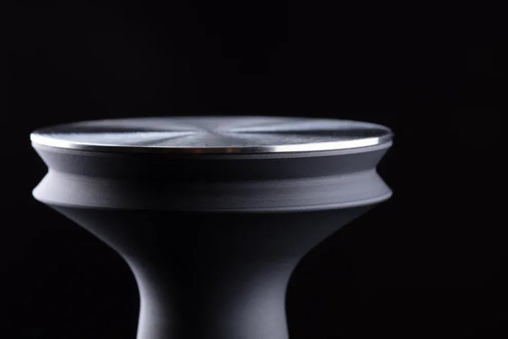 Barista Hustle coffee tamper featuring the double-flange design that eliminates vacuum