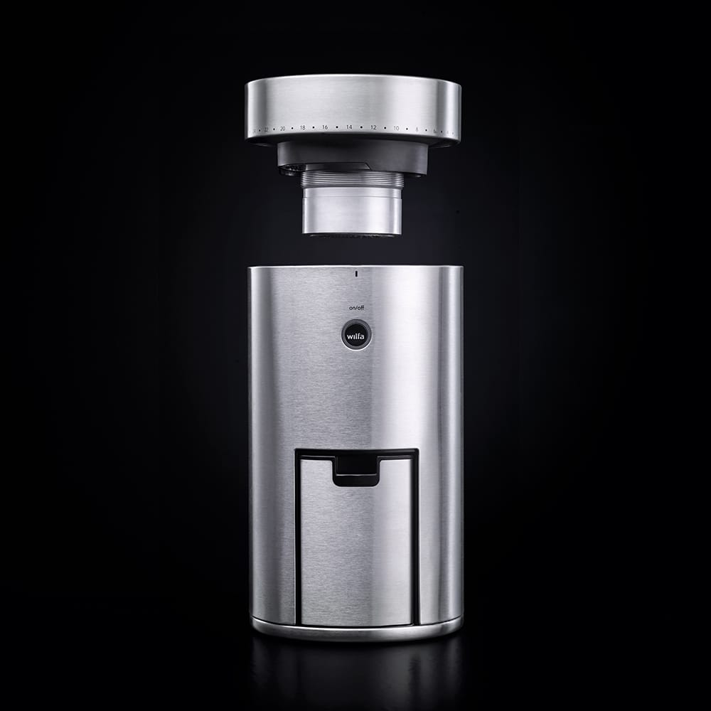 Wilfa Uniform Stainless steel coffee grinder on a black background