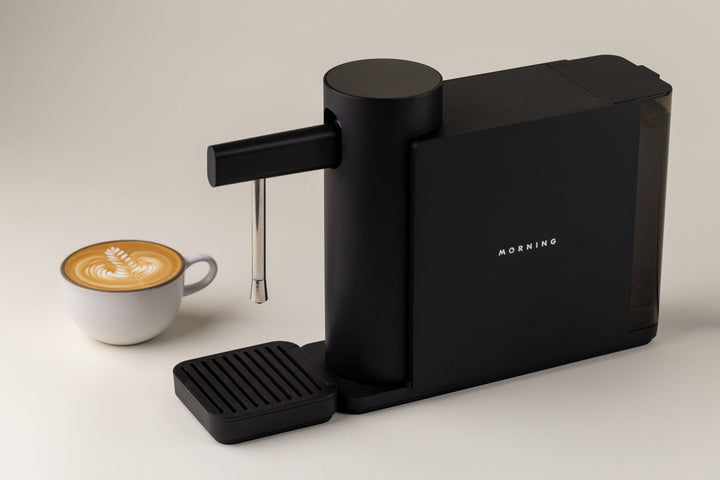 Morning Dream Milk Steamer — Black, with a finished latte