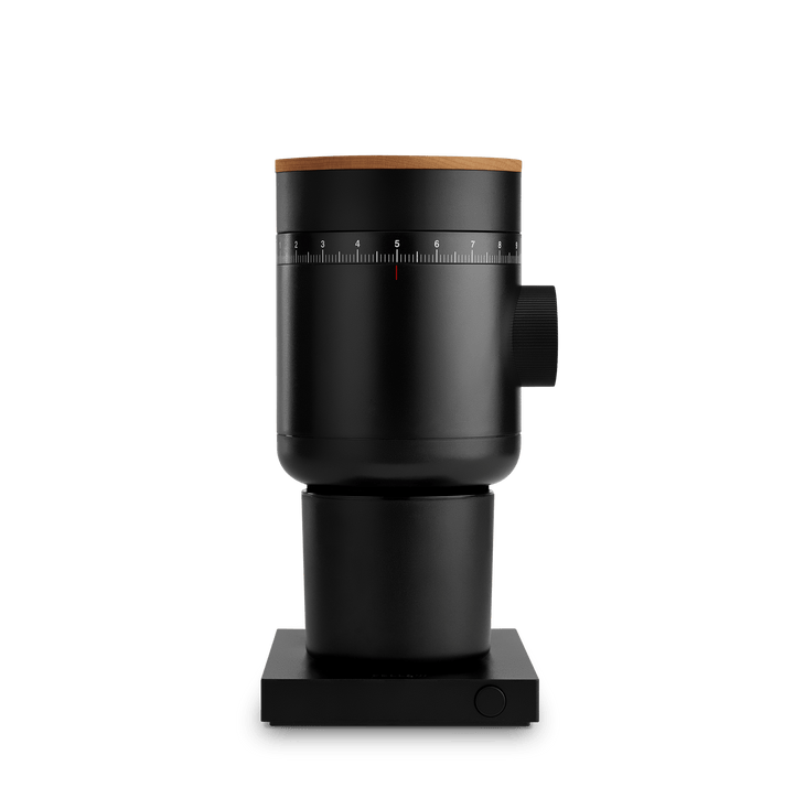 Fellow Opus 2 coffee grinder in Sesame with a maple wood lid