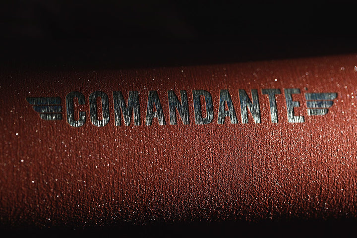 Close-up of a Comandante C40 Nitro Blade Coffee Grinder MK4 in Sunset with 'Comandante' branding.