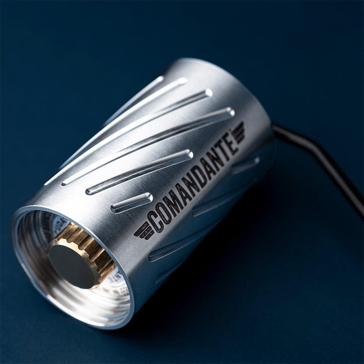 Comandante C60 Baracuda Coffee Grinder body in Velvet Steel with 'Comandante' branding on a dark blue background