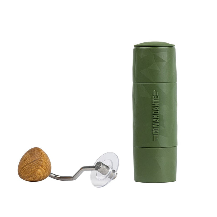 Comandante X25 Trailmaster Coffee Grinder in Forest Green with a wooden handle on a white background