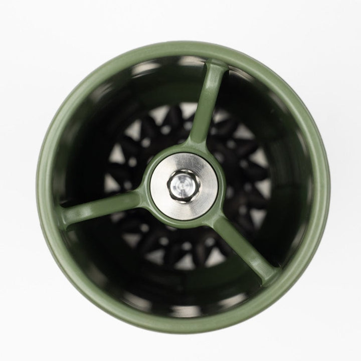 Top view of a Comandante X25 Trailmaster Coffee Grinder in Forest Green on a white background