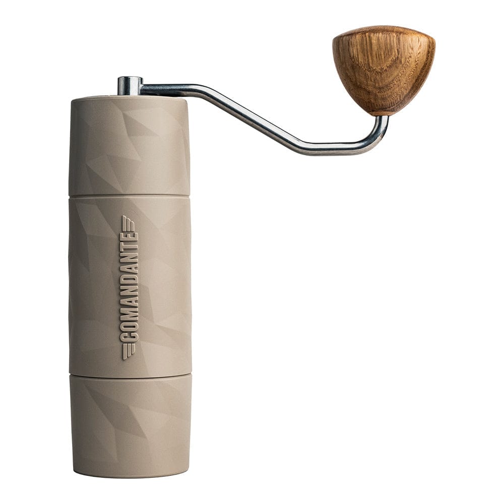 Comandante X25 Trailmaster Dune Coffee Grinder with wooden handle on a white background