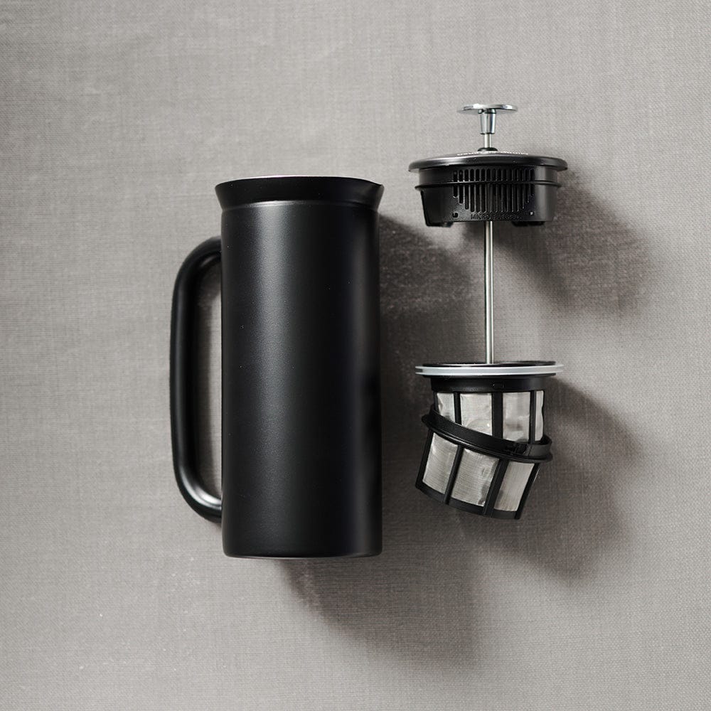 A Black ESPRO P7 French Press Coffee Maker with components on a grey background