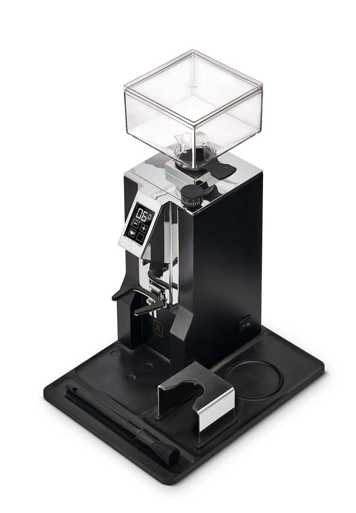 Eureka Mignon XL in Matt Black on its Mignon mat with tamping station