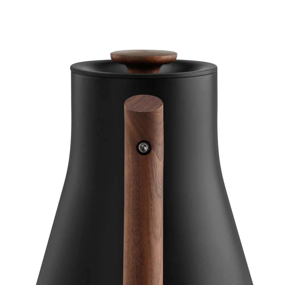 Close-up view of the Fellow Corvo EKG Electric Kettle in Matte Black and Walnut