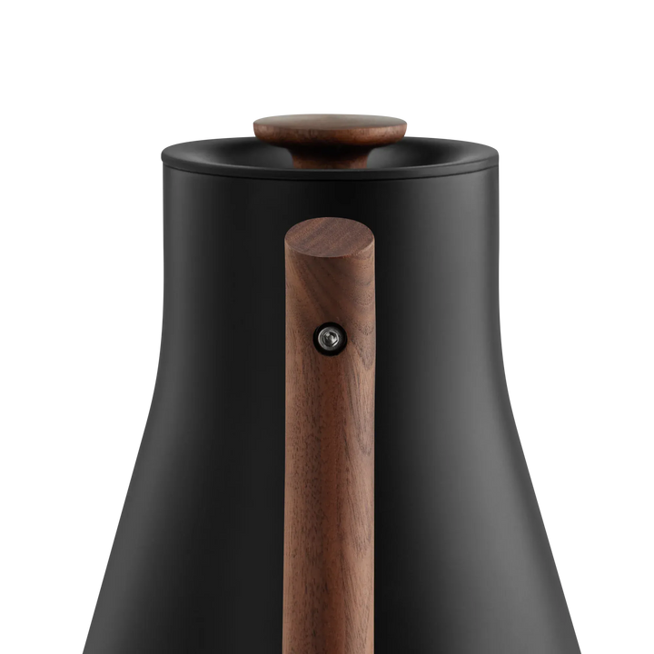 Close-up view of the Fellow Corvo EKG Electric Kettle in Matte Black and Walnut