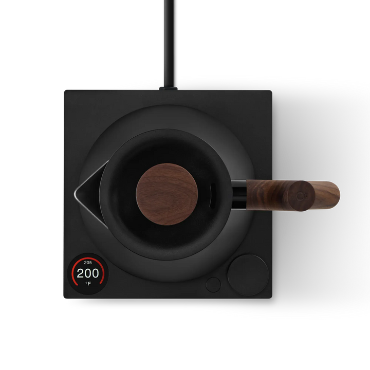 Top view of the Fellow Corvo EKG Pro Electric Kettle in Matte Black and Walnut on a white background