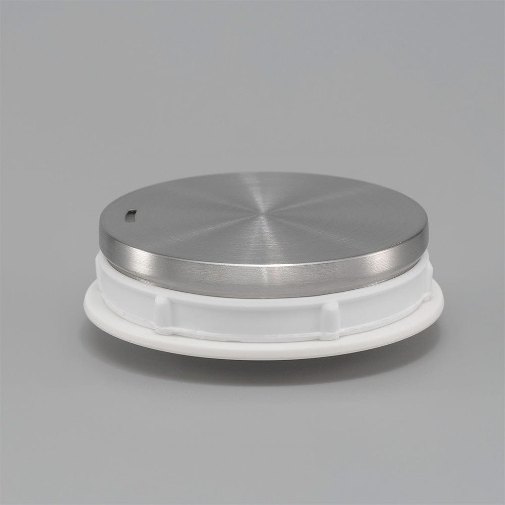 Hario Lyra lid on a grey background