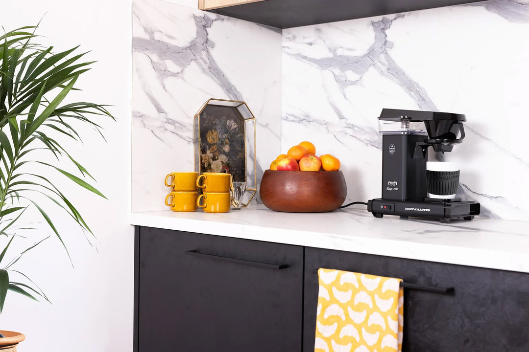 Moccamaster Cup One Coffee Brewer — Matte Black on a kitchen counter