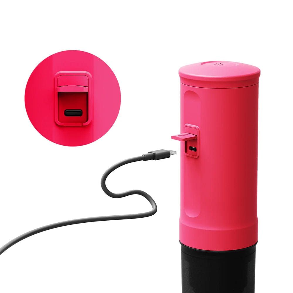 OutIn Nano Portable Espresso Coffee Machine in Fuchsia Pink with USB cable on a white background
