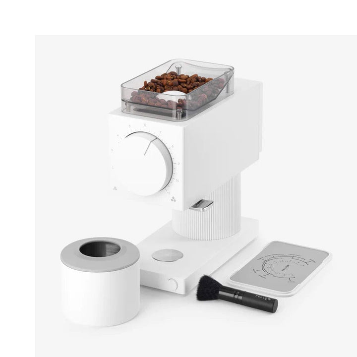 White Fellow Ode Gen 2 Electric Coffee Grinder with a clear container of coffee beans on a white background