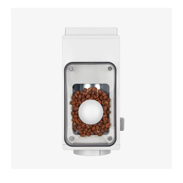 White Fellow Ode Gen 2 Electric Coffee Grinder with coffee beans on a white background