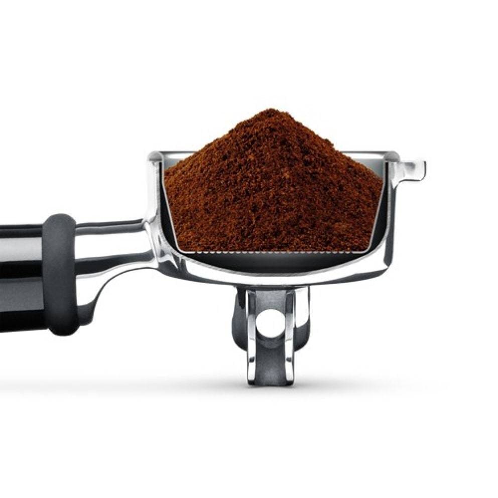 The Sage Dual Boiler Black Truffle Espresso Coffee Machine portafilter with ground coffee on a white background