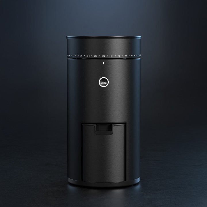 Wilfa Uniform Evo Electric Coffee Grinder with a Wilfa logo on a dark background