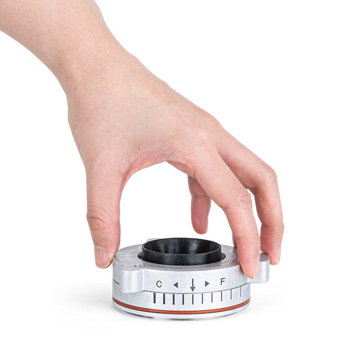 Holding the calibration tool for the Wilfa Uniform Evo Electric Coffee Grinder