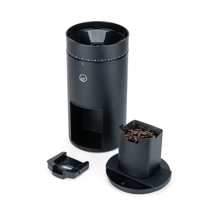 Wilfa Uniform Evo Electric Coffee Grinder with coffee beans on a white background